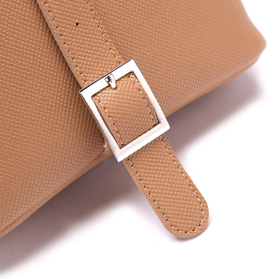 Cutout metal hardware faux leather bucket bag in Beige