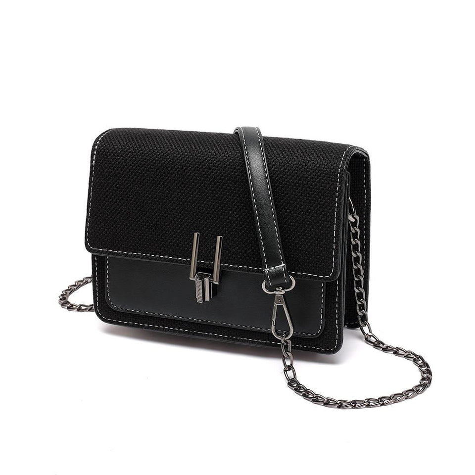 Turnlock linen crossbody bag in Black