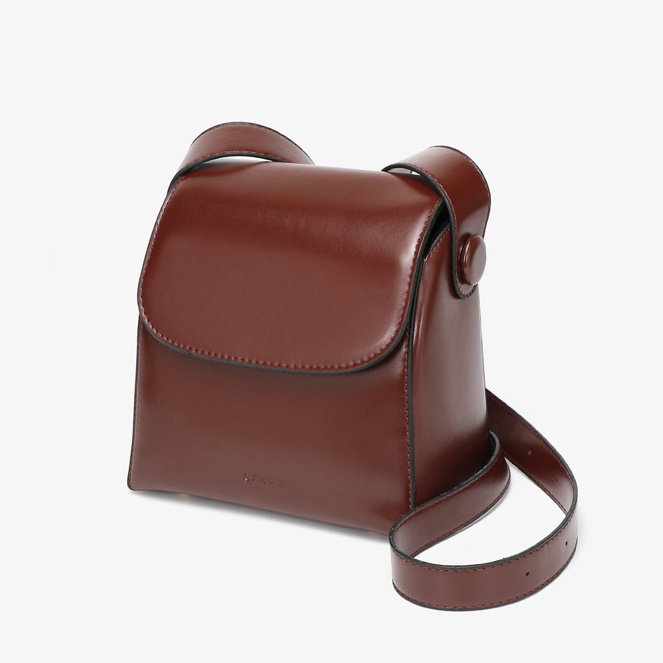 Retro streamlined PU leather crossbody bag in coffee