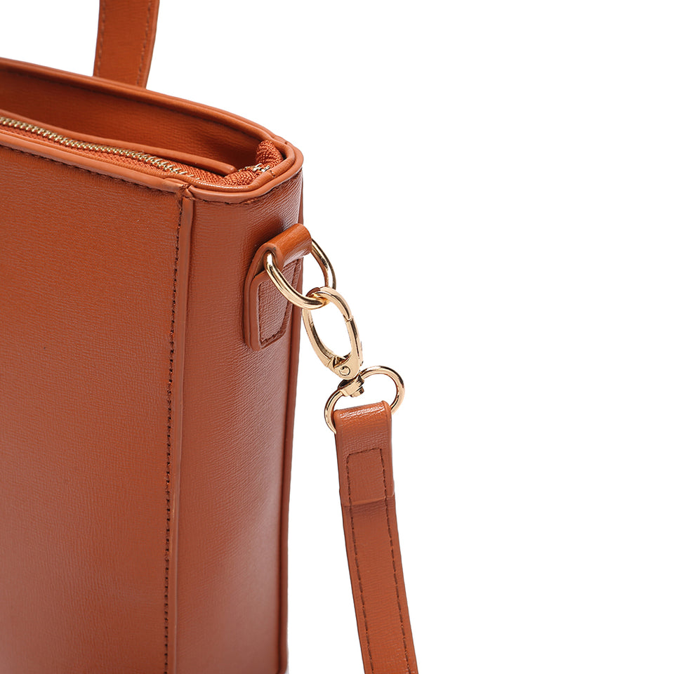 Inverted handle faux leather bucket crossbody bag in Brown