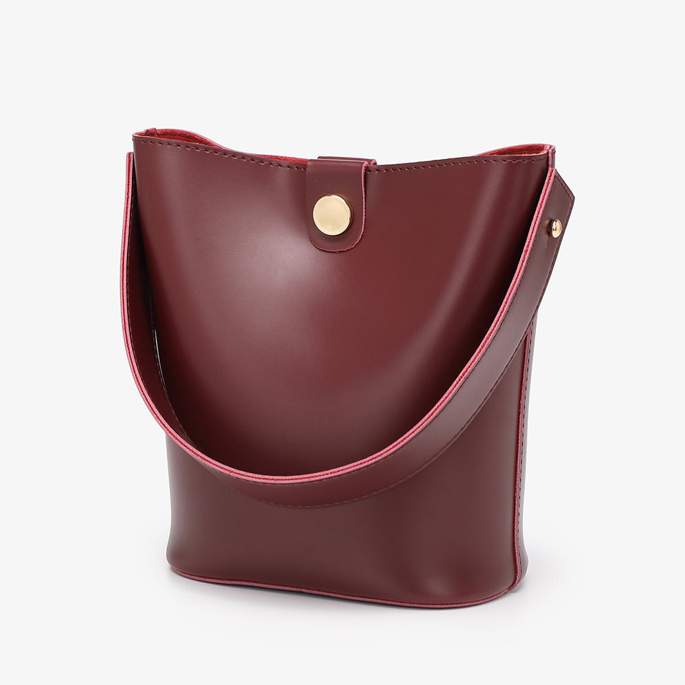 Studded PU leather 2-in-1 bucket bag in burgundy